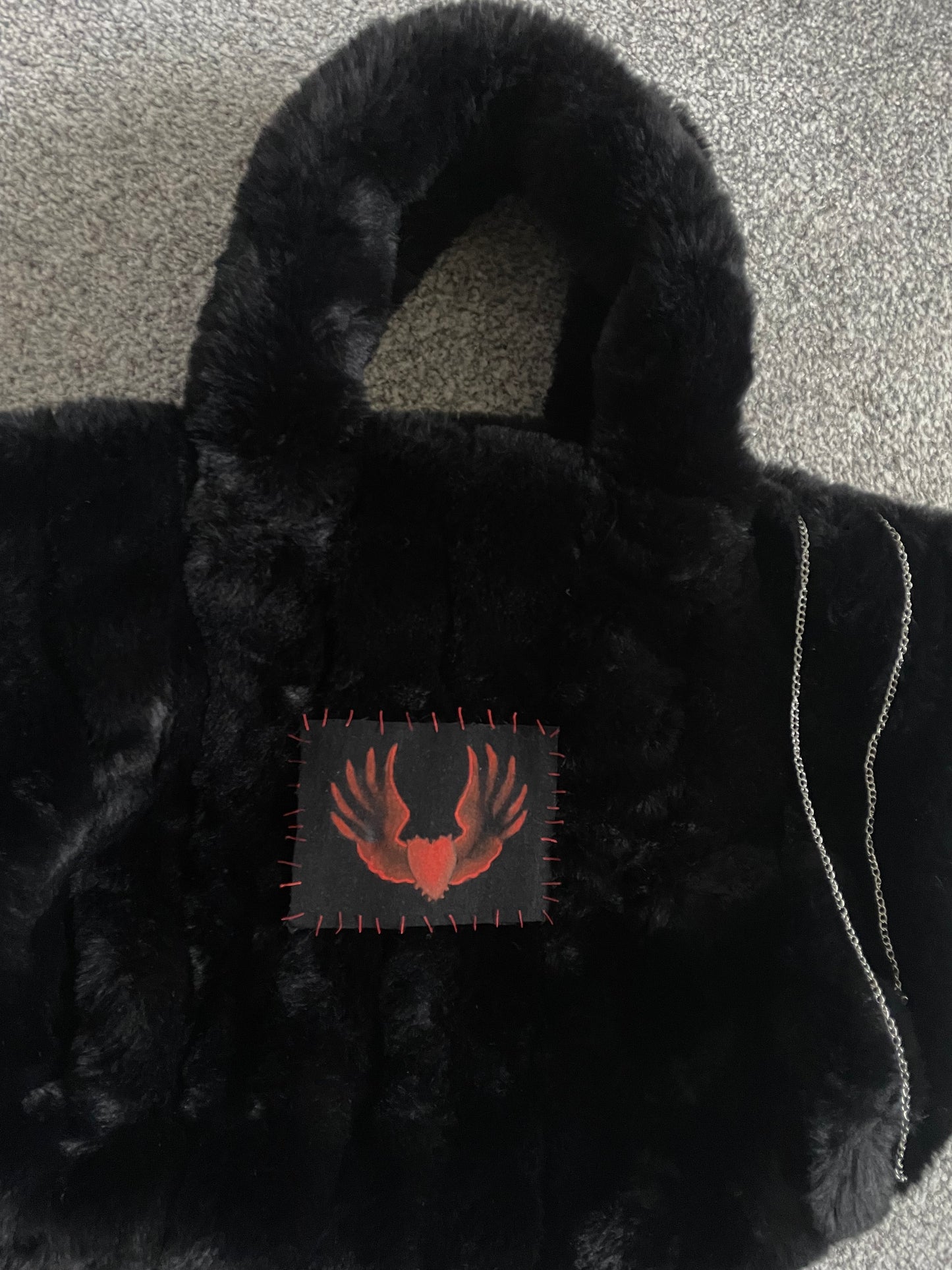 Spiked winged heart fluff cloud bag