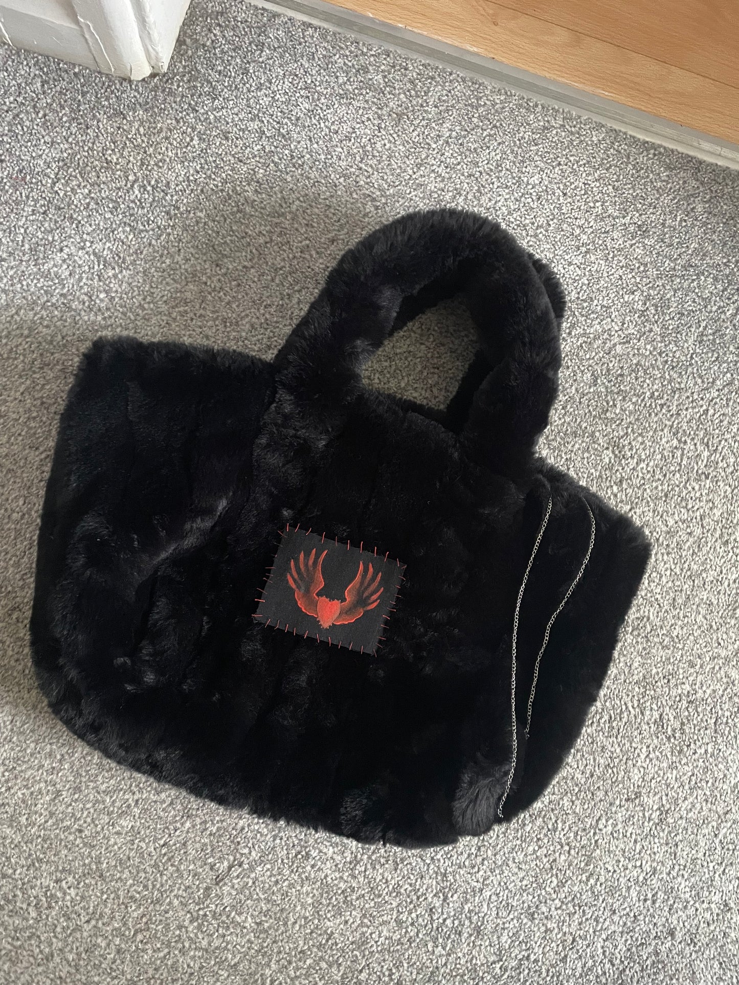 Spiked winged heart fluff cloud bag