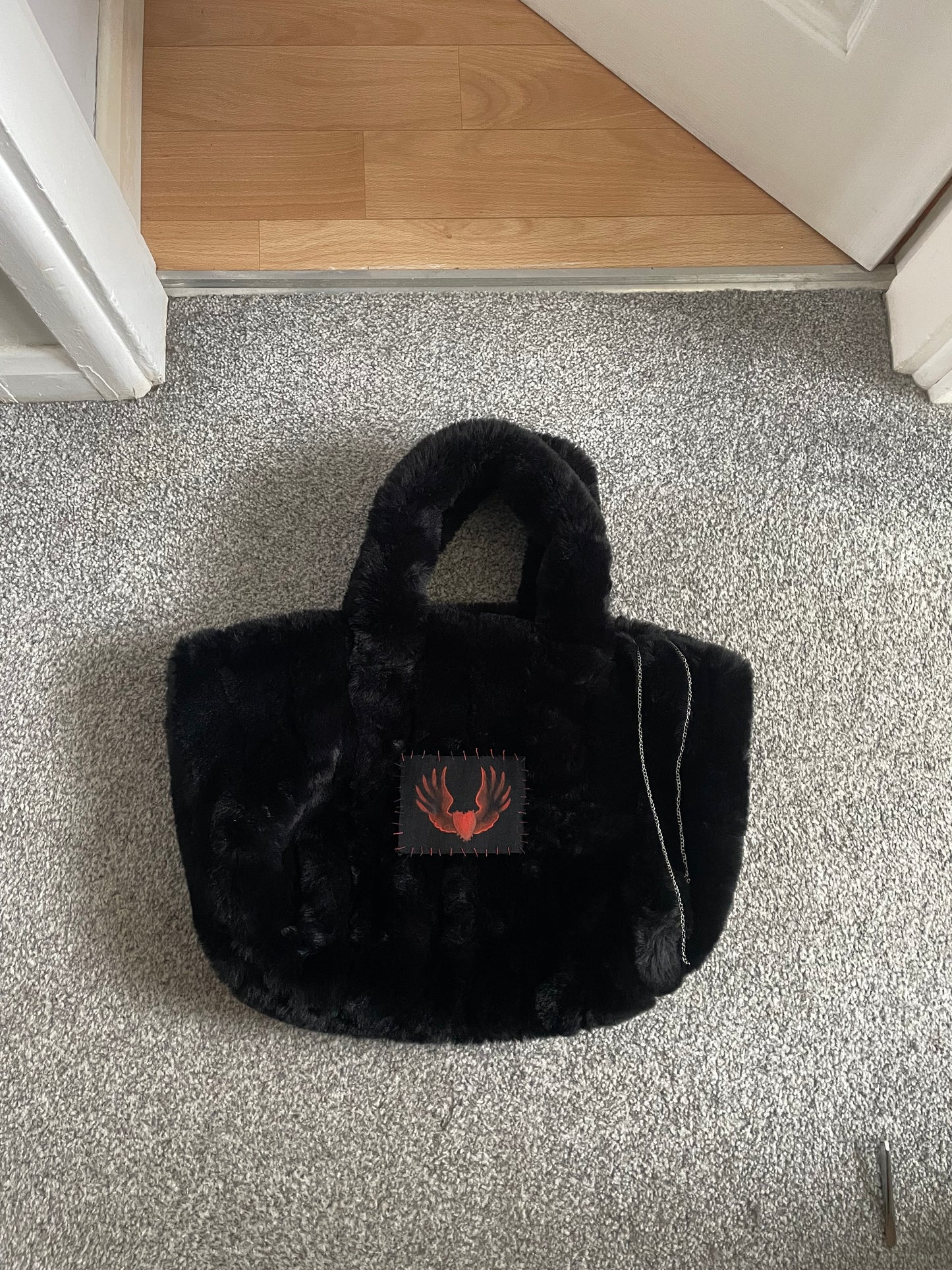 Spiked winged heart fluff cloud bag